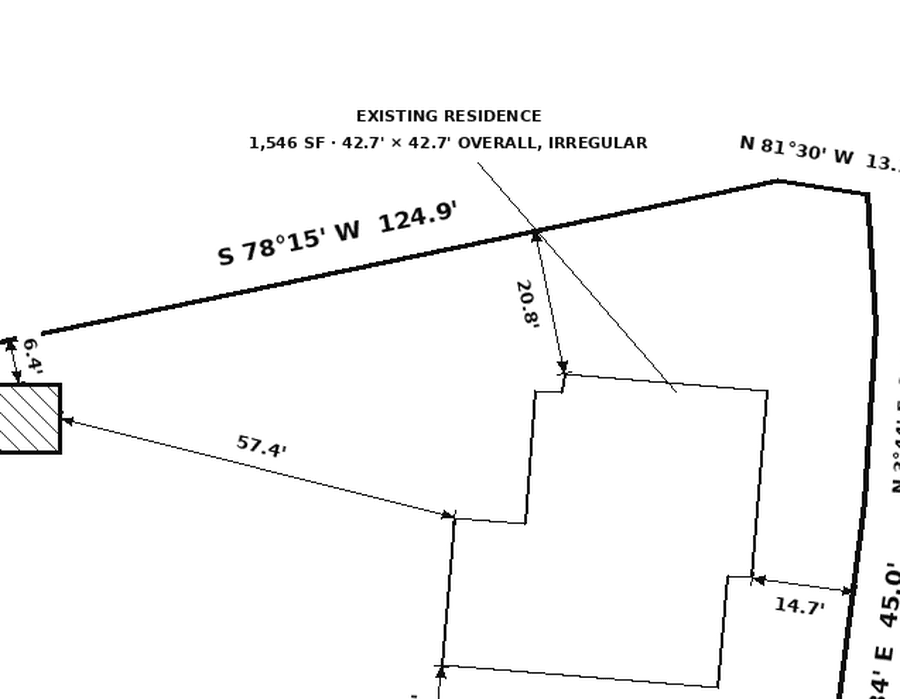 Close view of a site plan showing dimension labels around a proposed structure